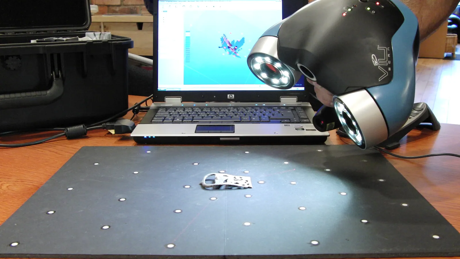 Handheld 3D scanner capturing the surface of an existing object